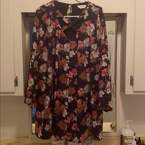 Floral dress with bell sleeve and button closure